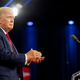 Former U.S. President Donald Trump applauds upon arrival at the Conservative Political Action Conference (CPAC) at the Hilton Anatole on August 06, 2022, in Dallas, Texas.